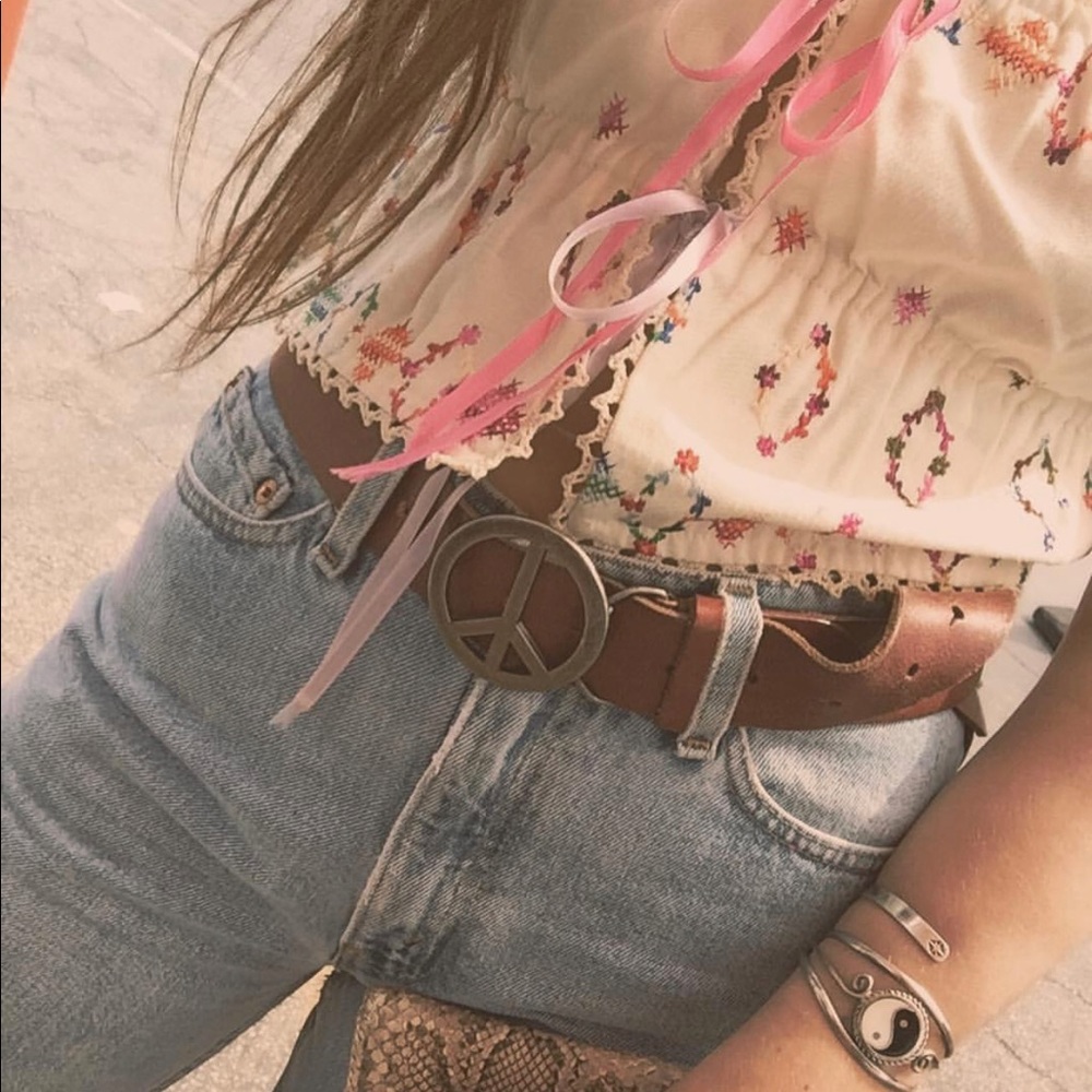 Brown leather peace sign belt